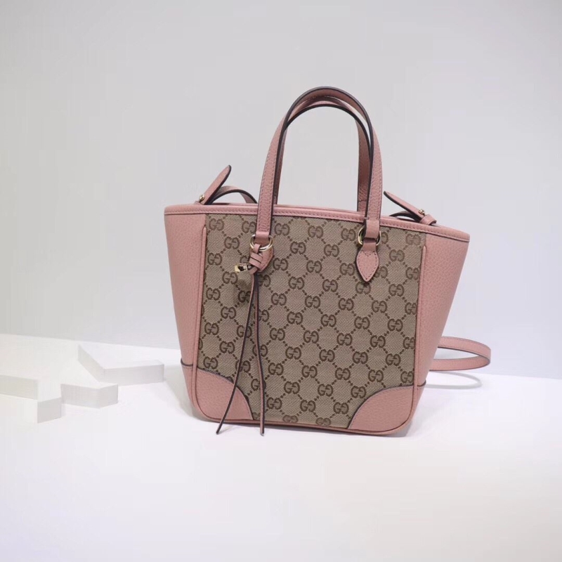 G*u*i shopping bags